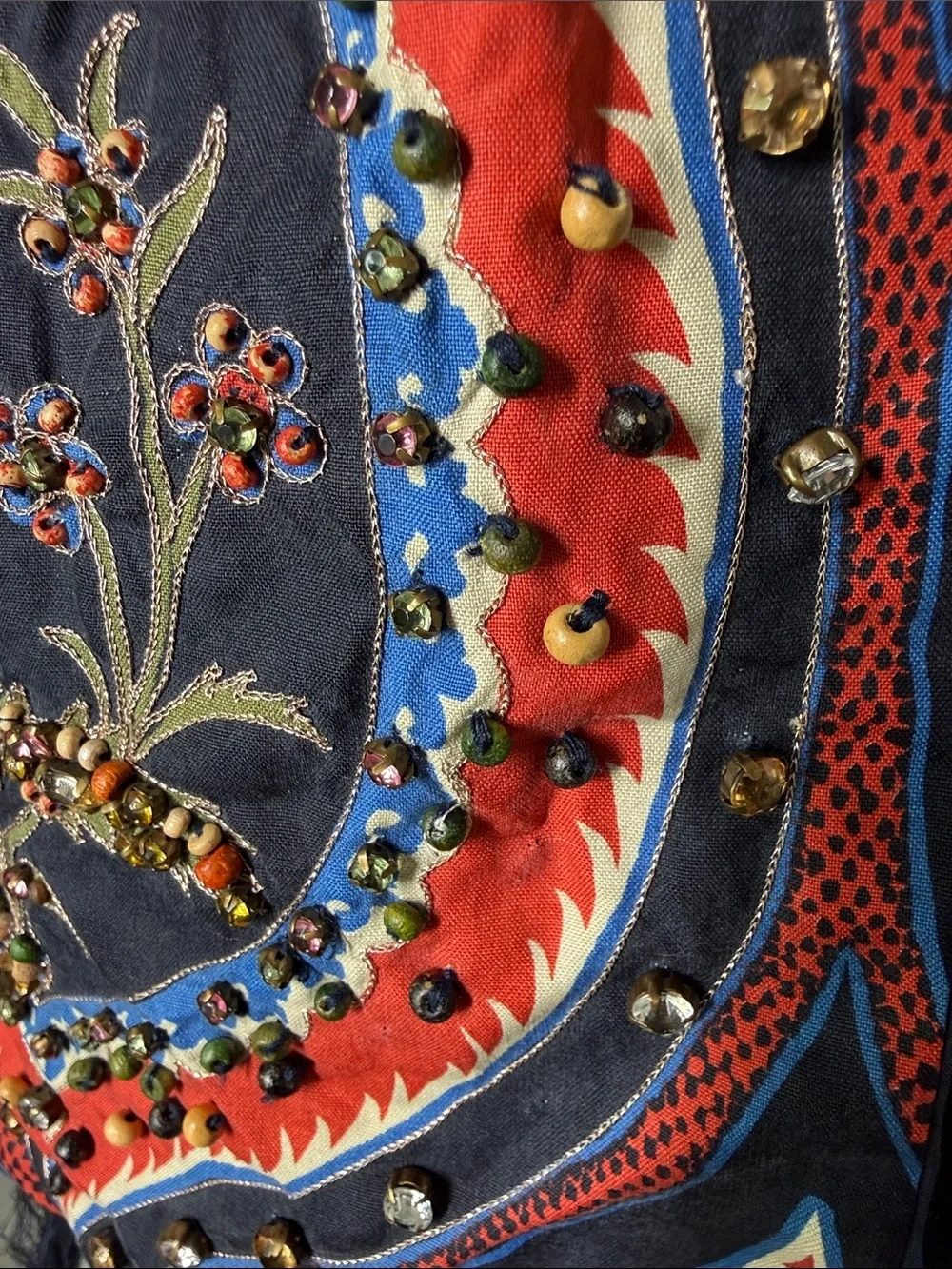 Navy bkue and red print scarf with fringe, beading, and jewel embellishments